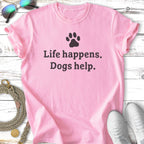 Pink t-shirt with "Life happens. Dogs help." text and paw print.