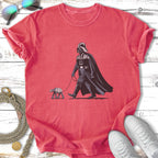 Darth Vader walking a small AT-ST walker on a leash.