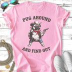 Pink t-shirt with pug in cowboy outfit holding a gun, text reads "Pug Around and Find Out".
