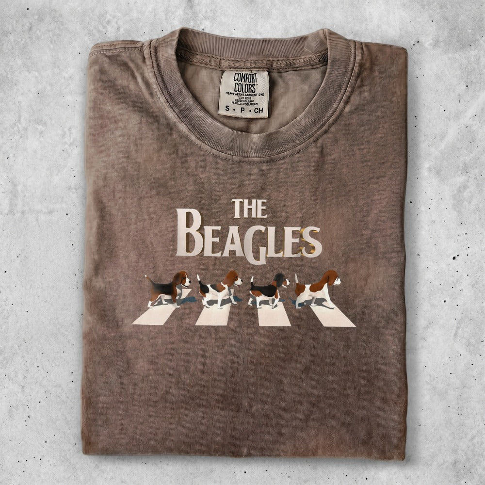 Brown t-shirt with "The Beagles" text and four beagles walking across a crosswalk.