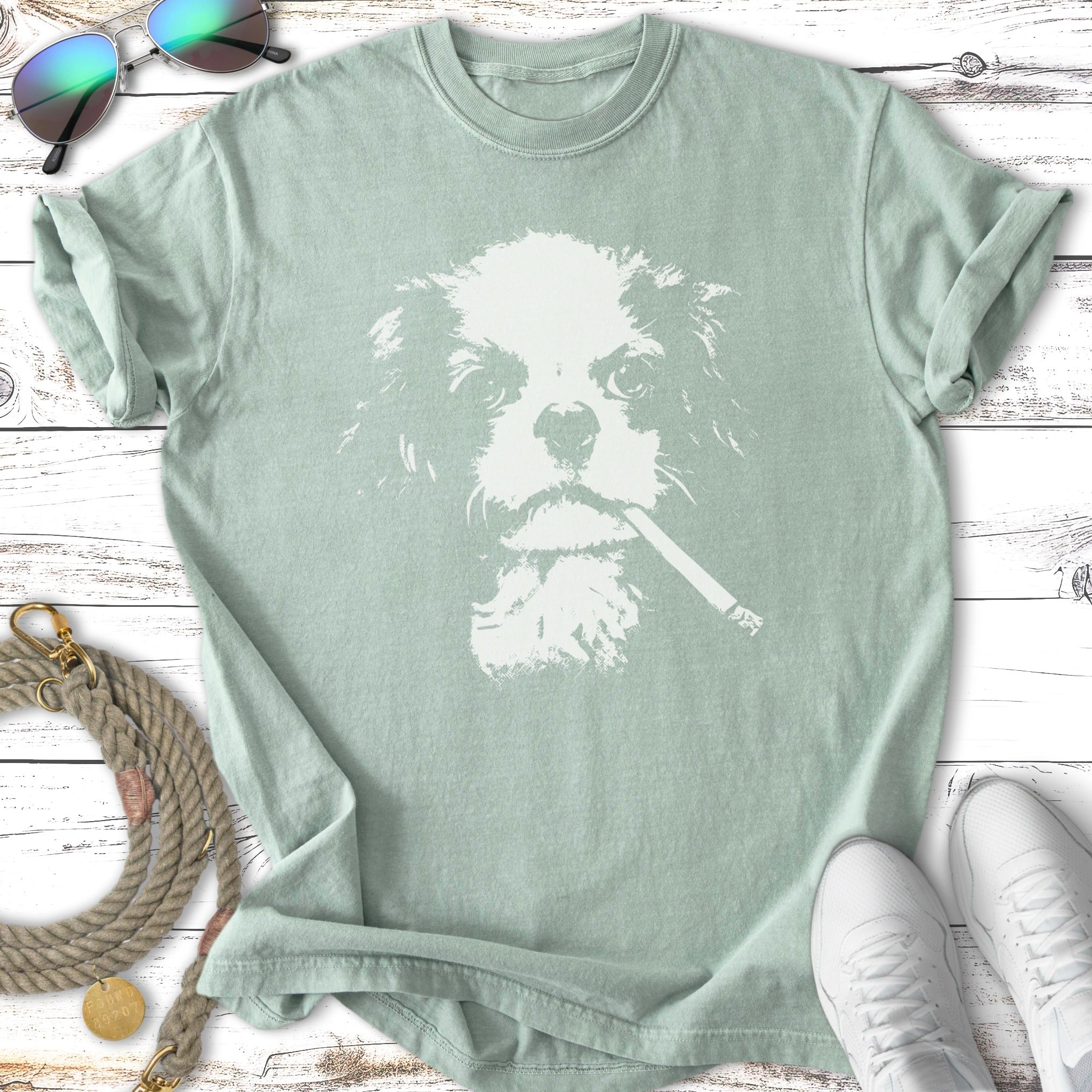T-shirt with a white graphic of a dog with a cigarette.