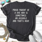 Dark t-shirt with "Proud Parent of a Dog Who Is Sometimes An Asshole And That's Okay" text.