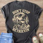 Grey t-shirt with dog wearing sunglasses and text "DON'T STOP RETRIEVIN'".