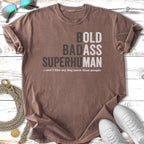 Brown t-shirt with "Bold Badass Superhuman" and dog quote.