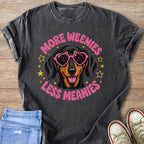 Dachshund wearing heart sunglasses with text "More Weenies Less Meanies".