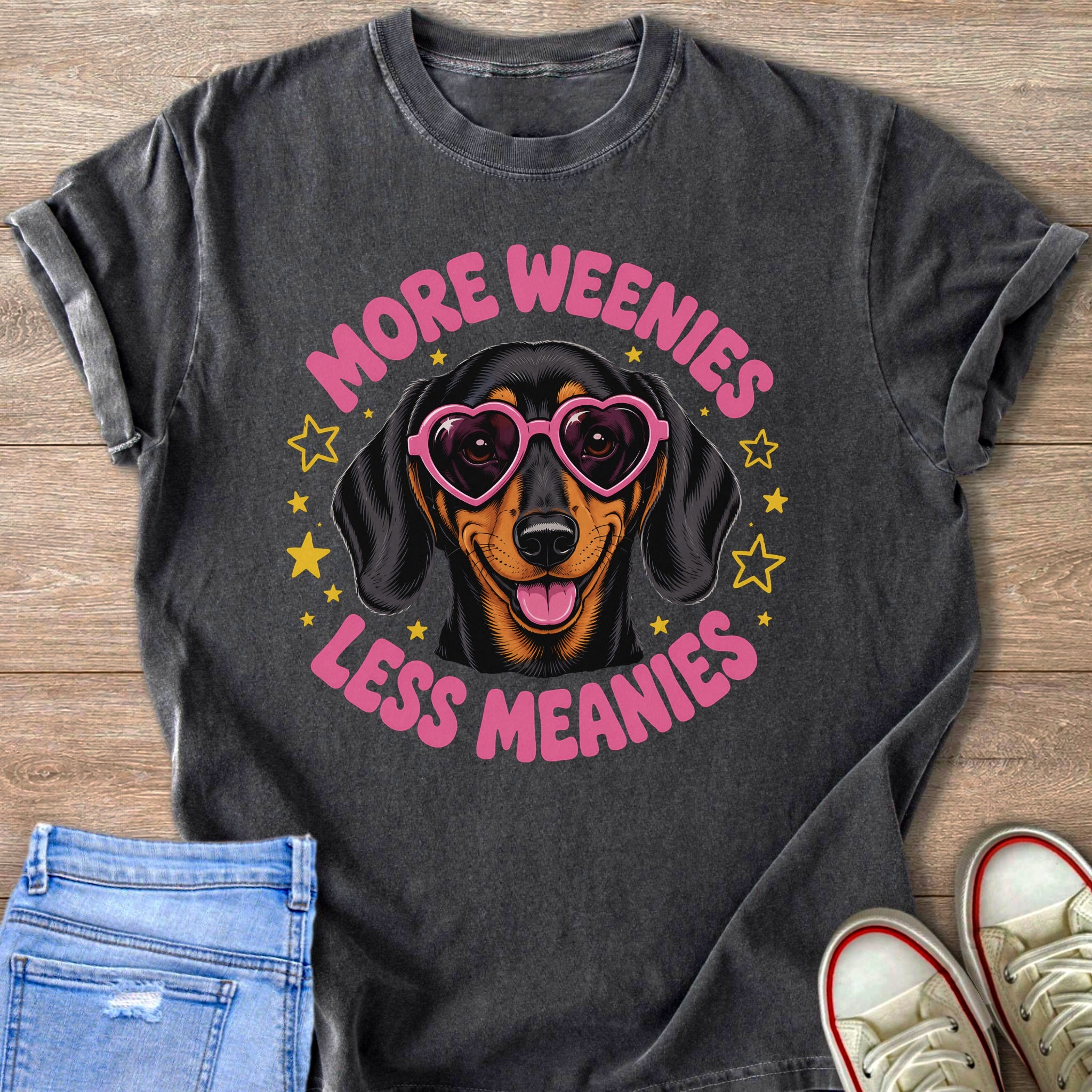 Dachshund wearing heart sunglasses with text "More Weenies Less Meanies".