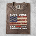 T-shirt with "Love Dogs and America Too" text and American flag with paw prints.