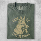 Green t-shirt with distressed print of a German Shepherd and text "EARS UP SYSTEM ARMED".
