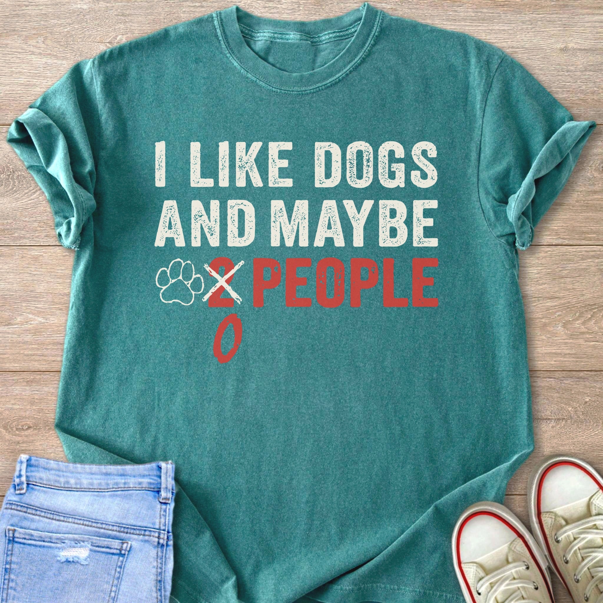 Teal t-shirt with distressed white text "I LIKE DOGS AND MAYBE 2 PEOPLE".