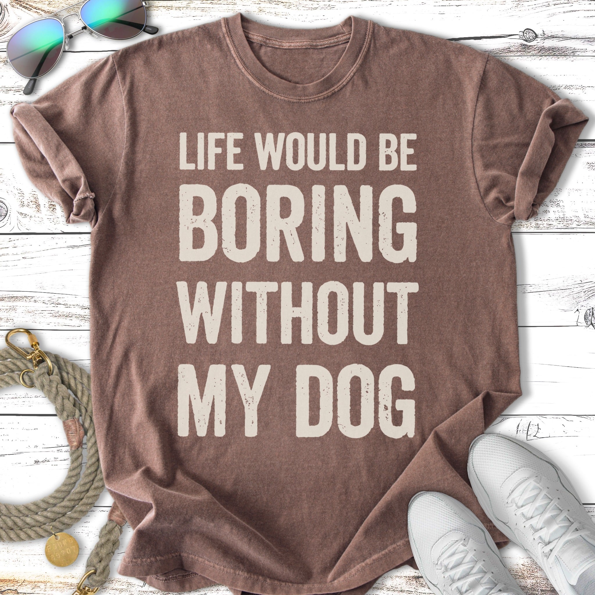 Brown t-shirt with "Life would be boring without my dog" text.