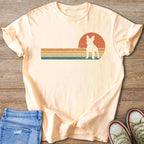Peach t-shirt with a vintage French Bulldog silhouette design.