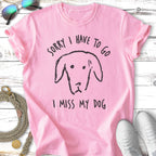 Pink t-shirt with "Sorry I Have To Go, I Miss My Dog" and a dog drawing.