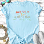 Light blue t-shirt with "i just want to knit & hang out with my dog" text.