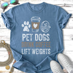 Blue t-shirt with "Pet dogs drink coffee lift weights" text and graphics.