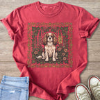 Red t-shirt with Cavalier King Charles Spaniel surrounded by floral vines.