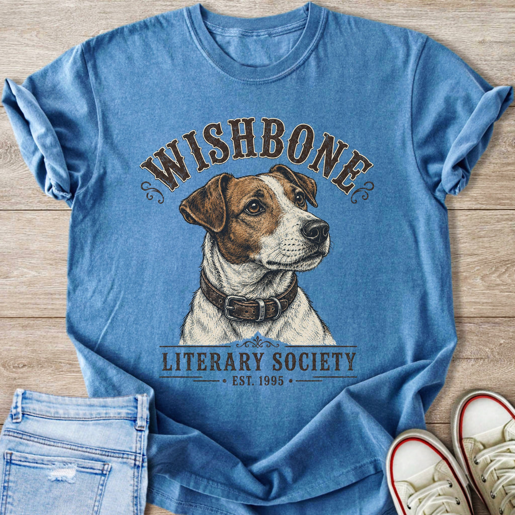 Blue t-shirt with a dog graphic and text "Wishbone Literary Society Est. 1995".