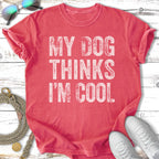 Coral t-shirt with "My Dog Thinks I'm Cool" graphic.