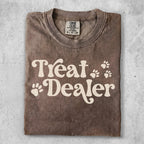 Brown t-shirt with "Treat Dealer" and paw print graphics.