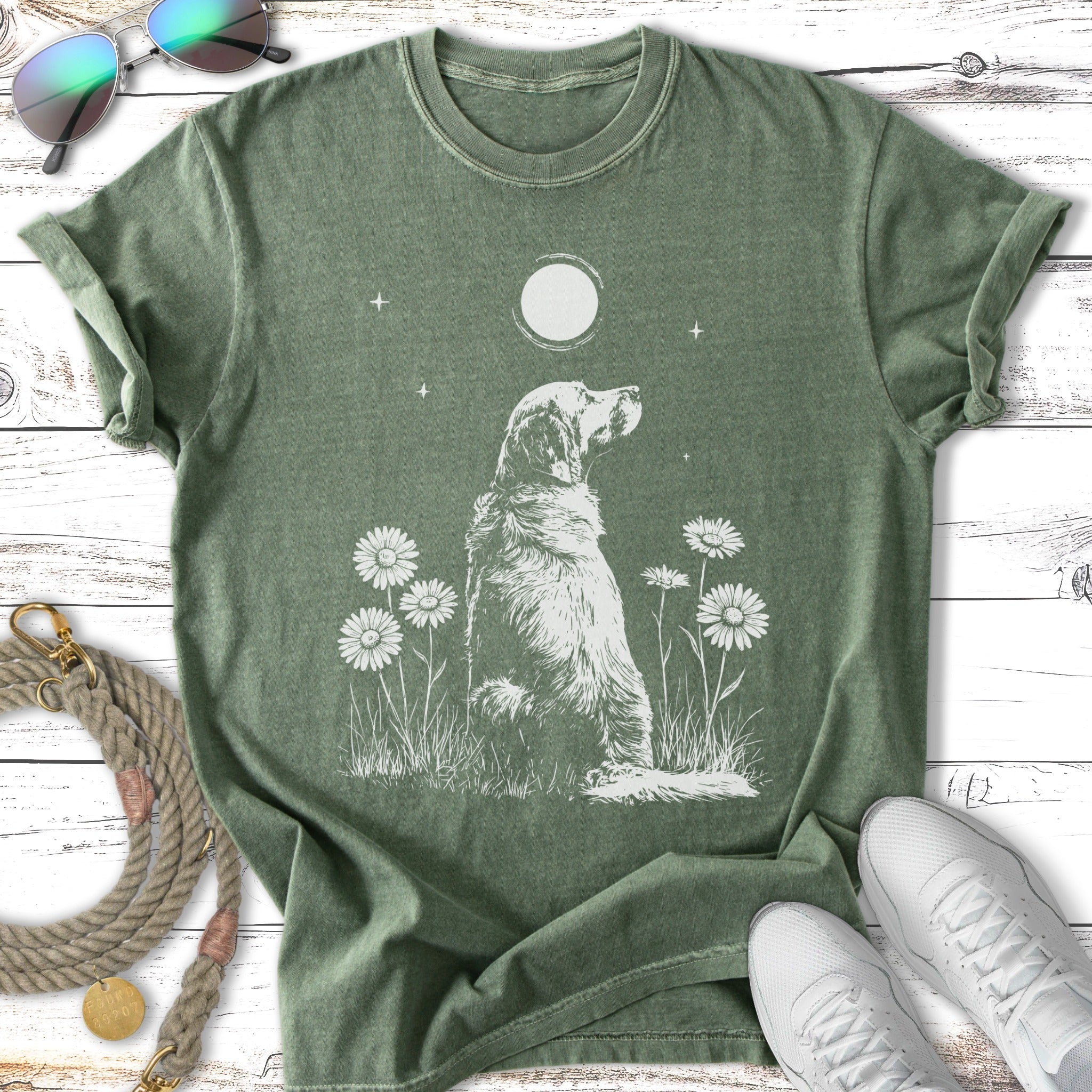 Golden retriever seated among daisies under a full moon.