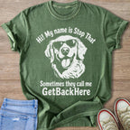 Green t-shirt with a white graphic of a dog wearing sunglasses and text.