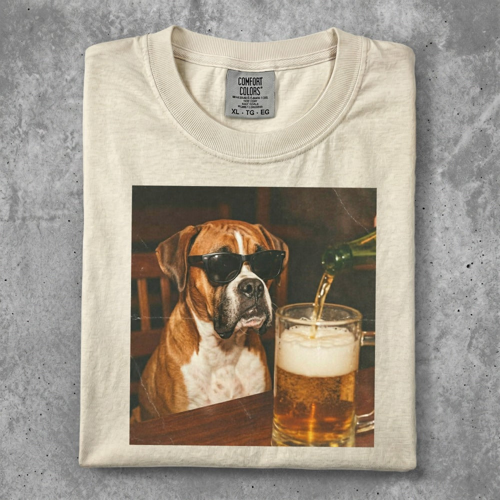 Boxer dog in sunglasses pours beer into a frothy mug.