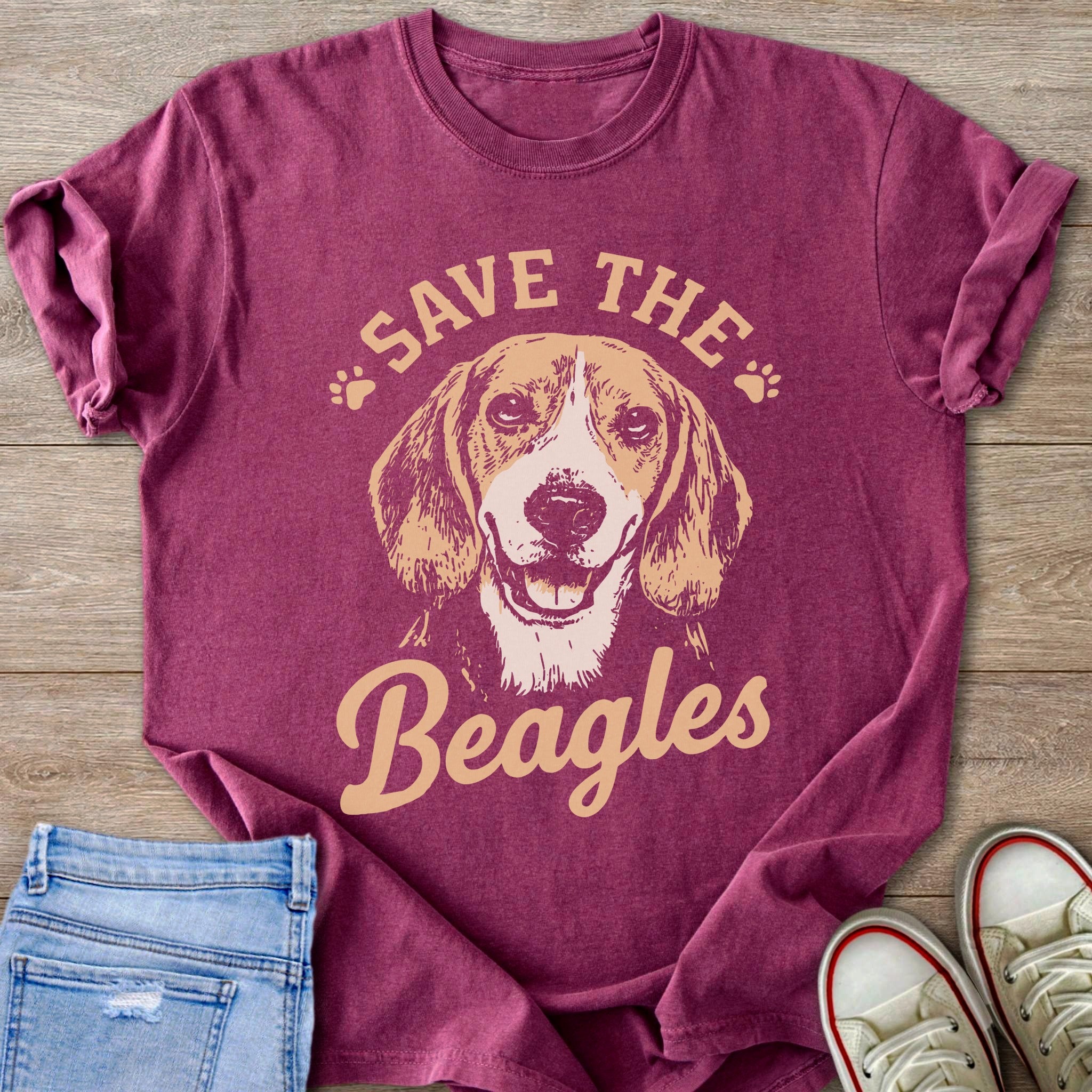 Maroon t-shirt with a beagle graphic and the text "SAVE THE Beagles".