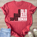 Crimson t-shirt with "BOLD BADASS SUPERHUMAN" text and dog quote.