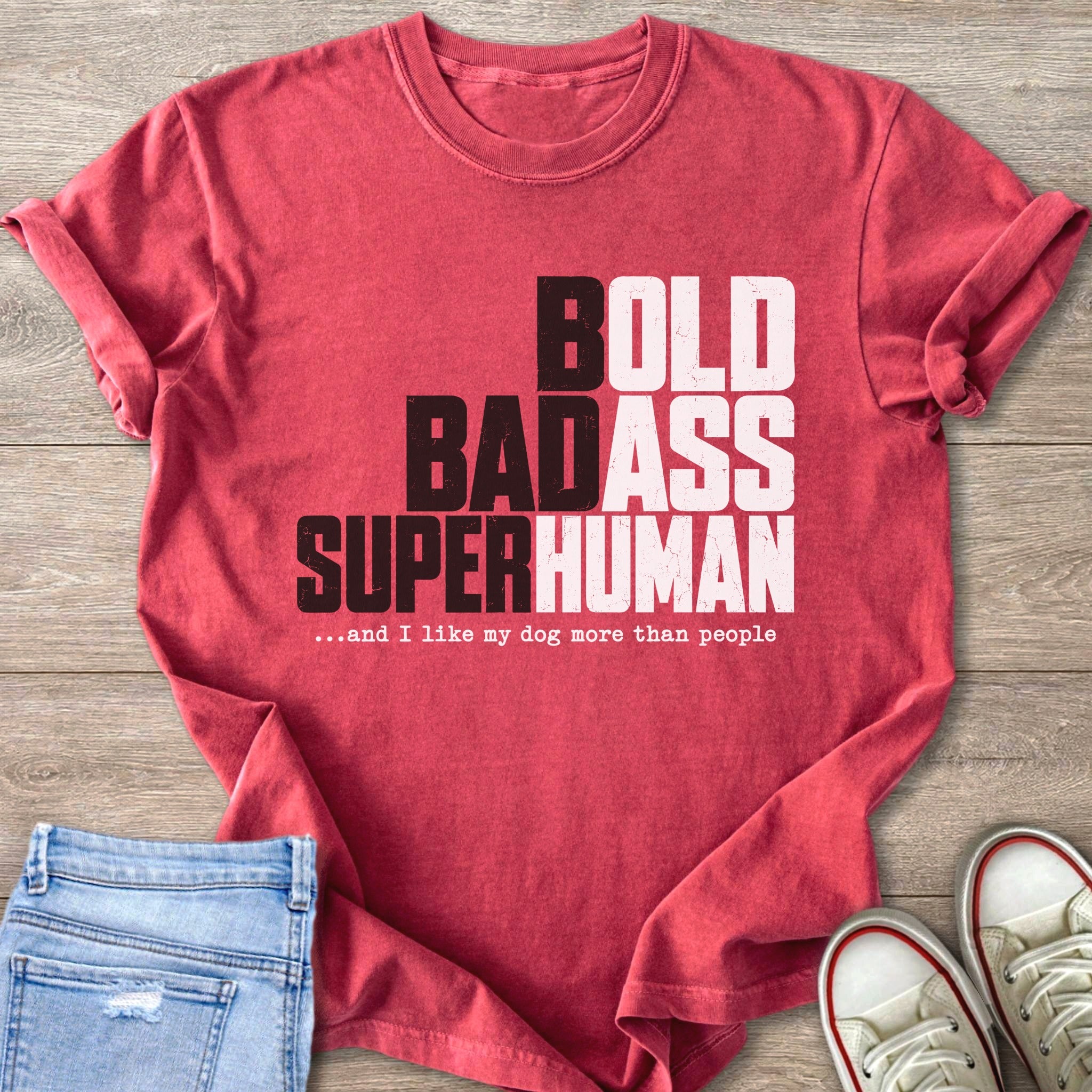 Crimson t-shirt with "BOLD BADASS SUPERHUMAN" text and dog quote.