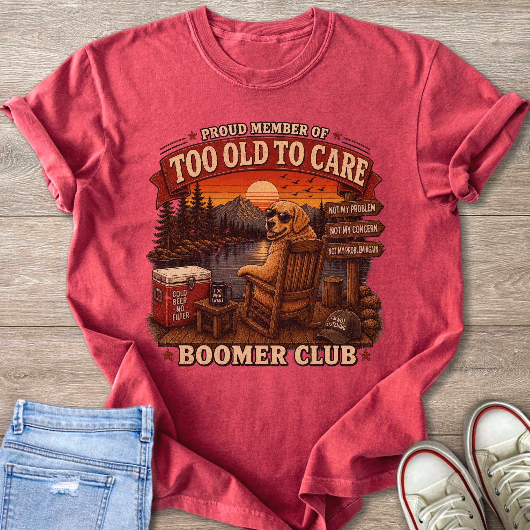 Proud member of Too Old To Care Boomer Club graphic on a red t-shirt.