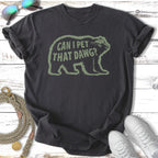 Dark t-shirt with green text "CAN I PET THAT DAWG?" and bear graphic.