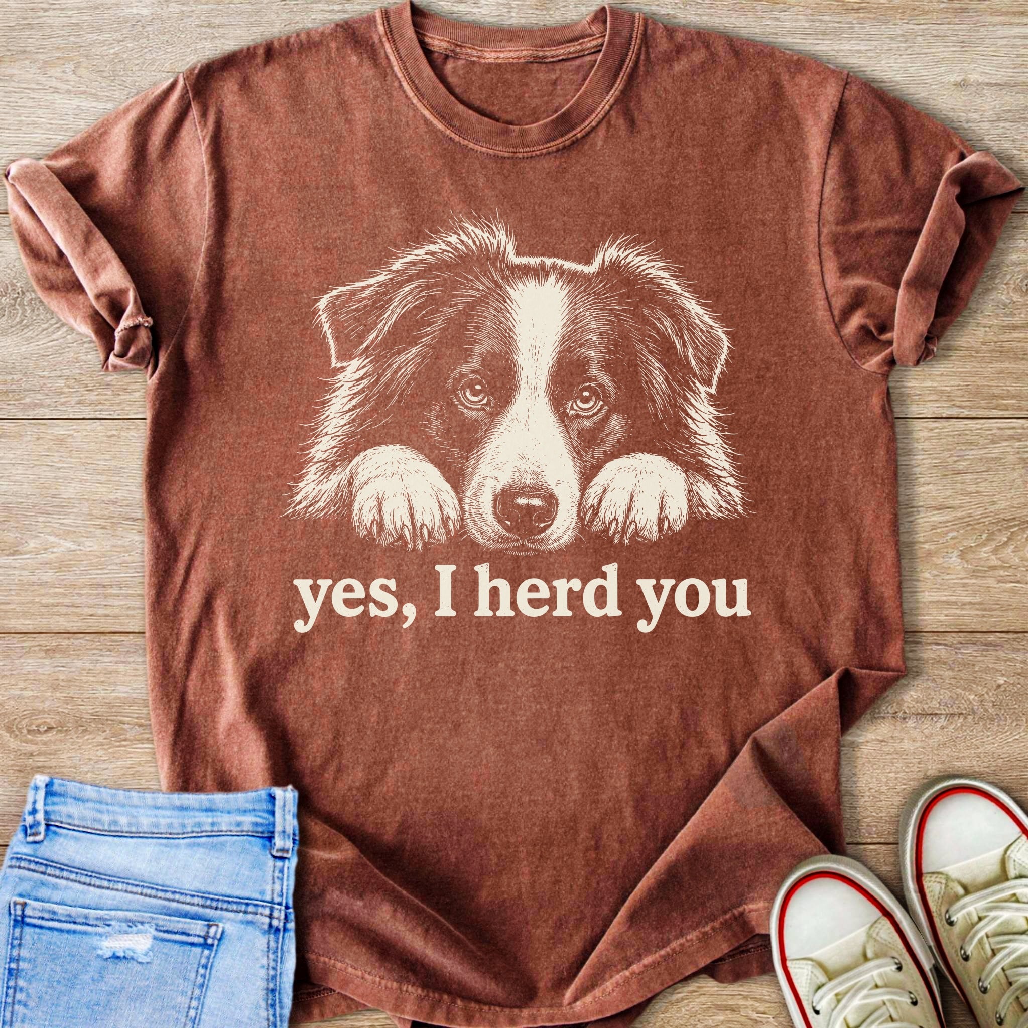 Brown t-shirt with a sketched dog and the text "yes, I herd you."