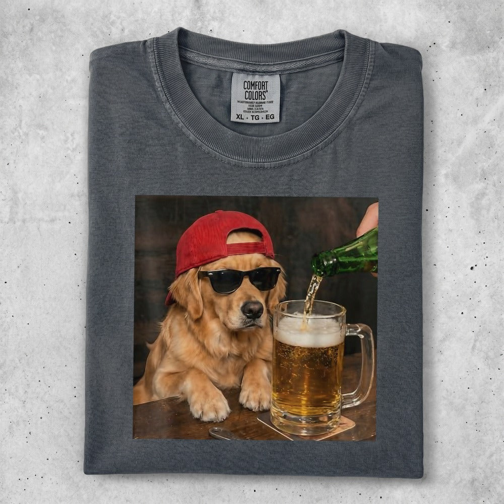 Golden Retriever wearing sunglasses and a red hat pours beer into a mug.