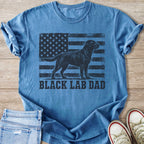 Blue t-shirt with distressed American flag and black lab, text "BLACK LAB DAD".