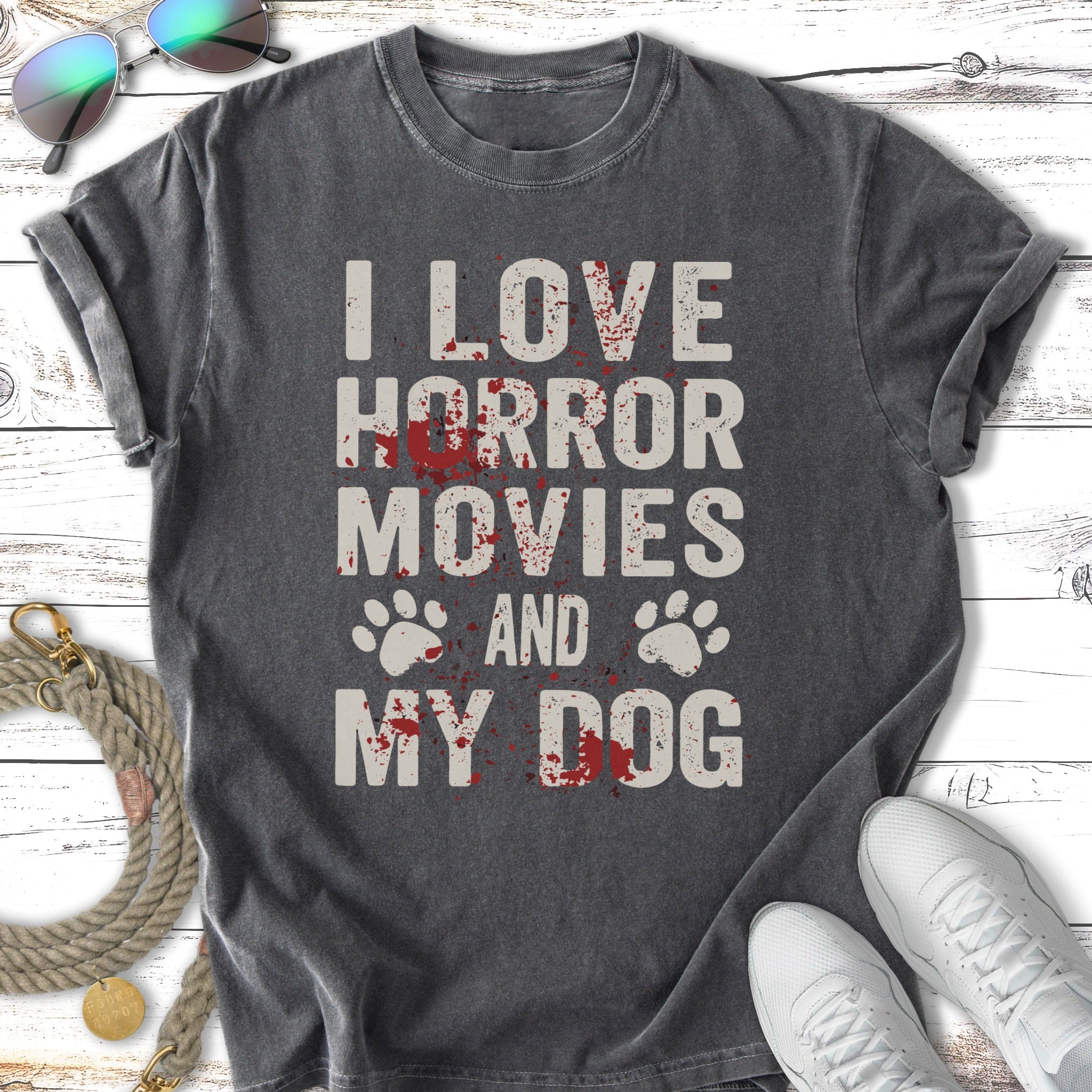 "I Love Horror Movies and My Dog" graphic tee with paw prints.