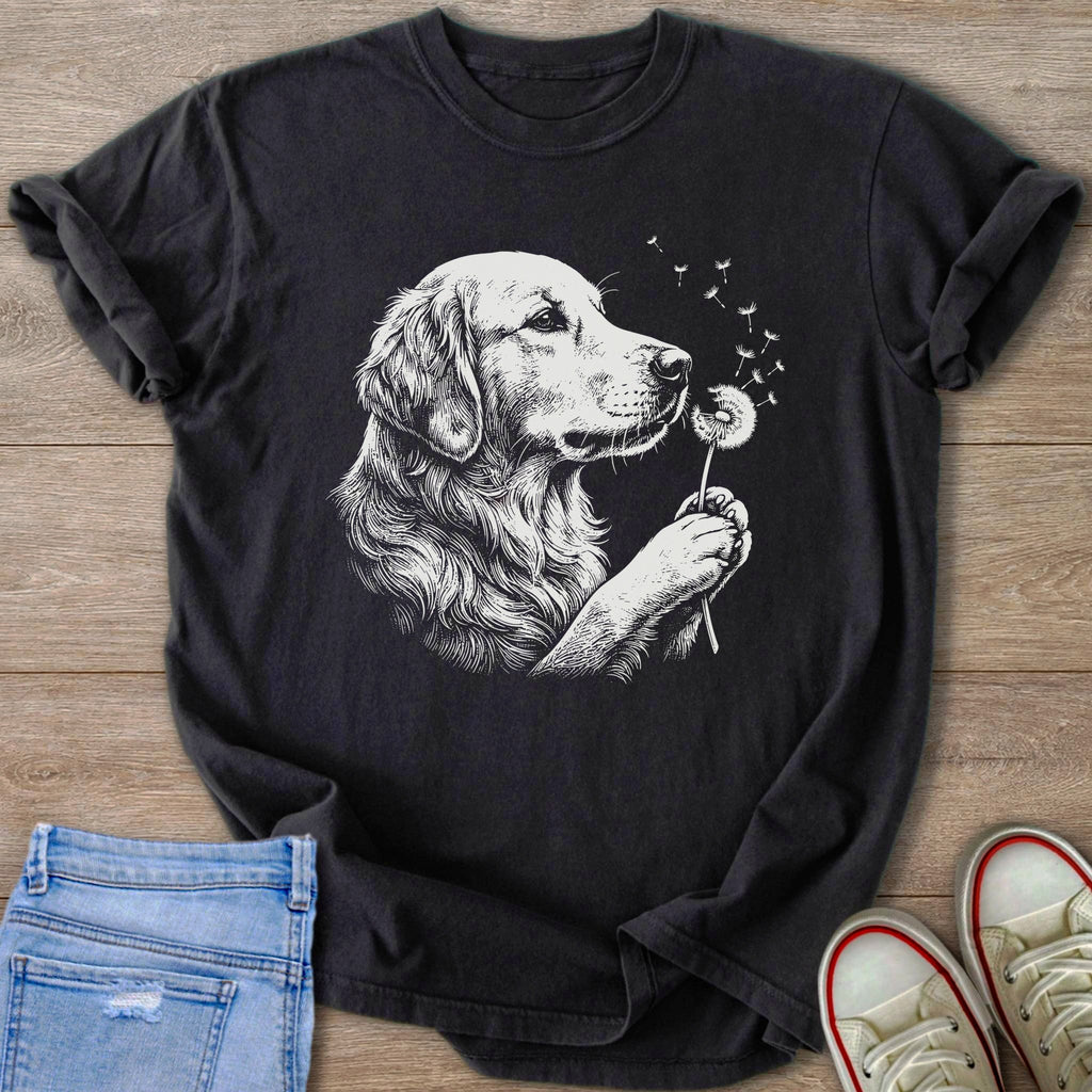 Black t-shirt featuring a sketch of a golden retriever blowing on a dandelion.