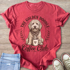 Golden Doodle with coffee mug and text "The Golden Doodle Coffee Club".