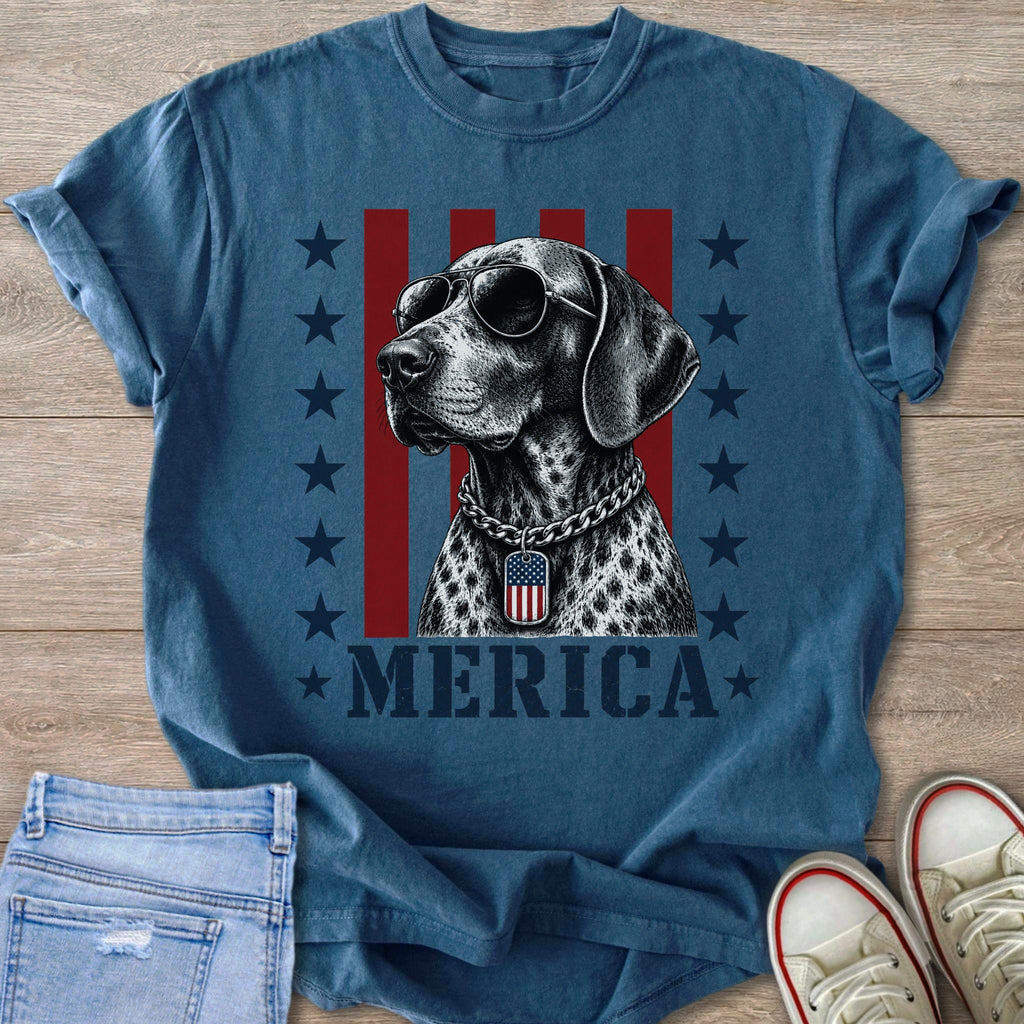 Dog wearing sunglasses with American flag tag and "MERICA" text.