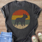 Black French Bulldog silhouette on a vintage-style striped circle graphic on a dark grey t-shirt.