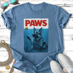 German Shepherd dog swimming underwater reaching for a ball on a t-shirt.