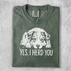 Green t-shirt with "YES, I HERD YOU" and a dog graphic.