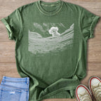 Moss Comfort Colors 1717 t-shirt with a white graphic of a fluffy white dog from silence of the lambs peering over a well.