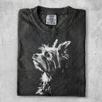 Dark t-shirt with a white terrier dog silhouette on the chest.
