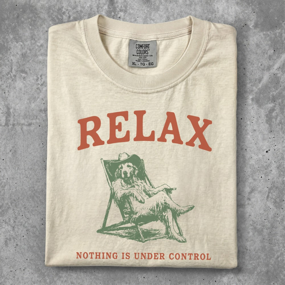 T-shirt with "RELAX NOTHING IS UNDER CONTROL" and dog in lounge chair graphic.