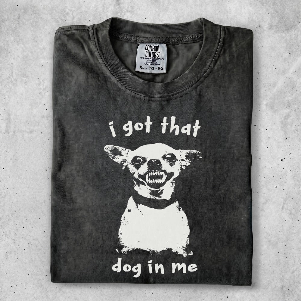 Dark t-shirt with "i got that dog in me" and a snarling dog graphic.