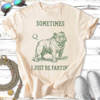 Bulldog graphic on cream t-shirt reads "SOMETIMES I JUST BE FARTIN'".