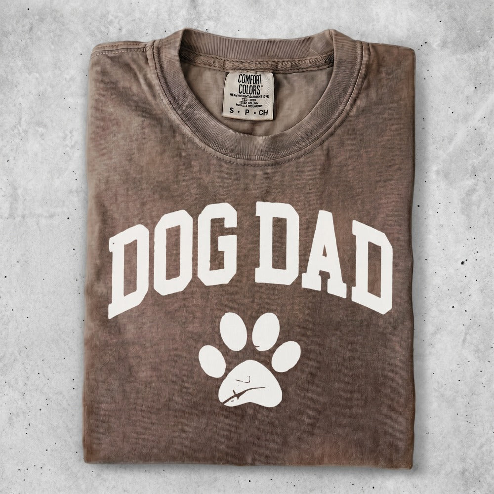 Brown t-shirt with "Dog Dad" and paw print graphic.