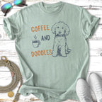 T-shirt with "Coffee and Doodles" text and a sitting doodle dog illustration.