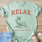 Mint t-shirt with "RELAX" graphic and text "NOTHING IS UNDER CONTROL"