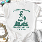 White t-shirt with "Gardening and Dogs Because Murder Is Wrong" text and gardening graphic.