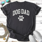 Dark t-shirt with "DOG DAD" text and a paw print graphic.